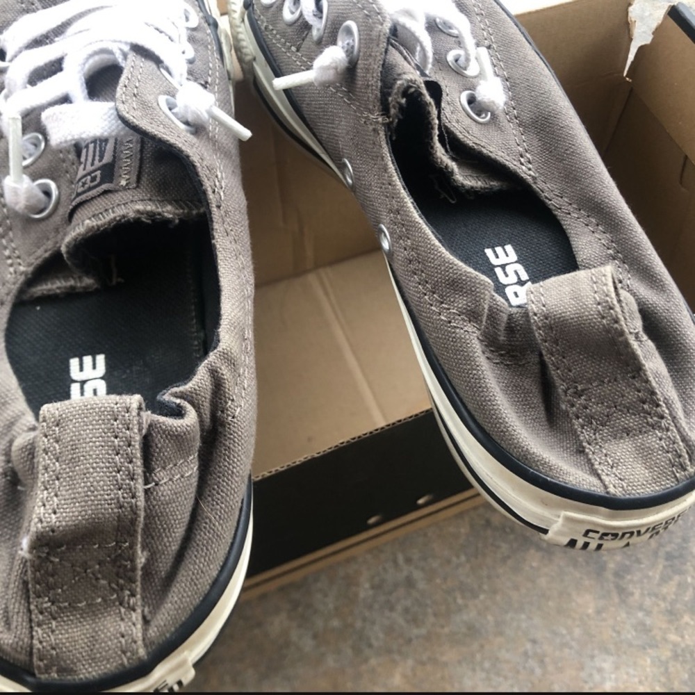 Woman’s grey converse